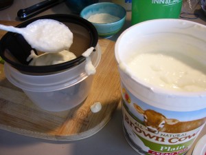 Scoop yogurt into strainer